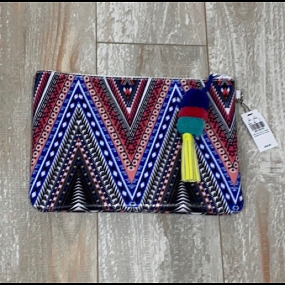 NWT pom pom tassel clutch